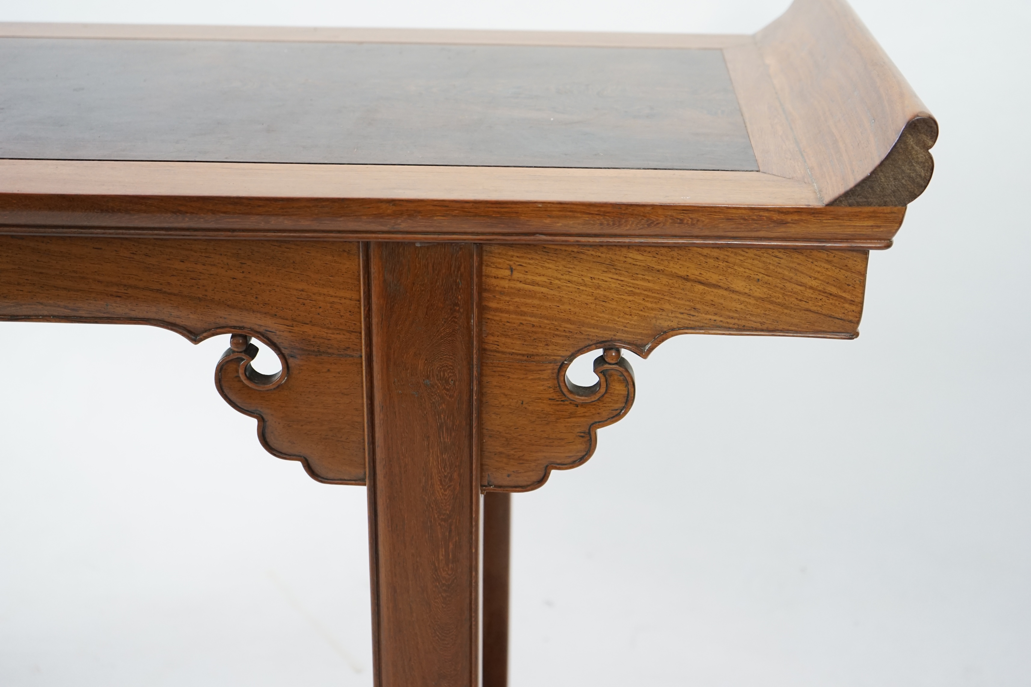 A Chinese padouk wood and jichimu altar table